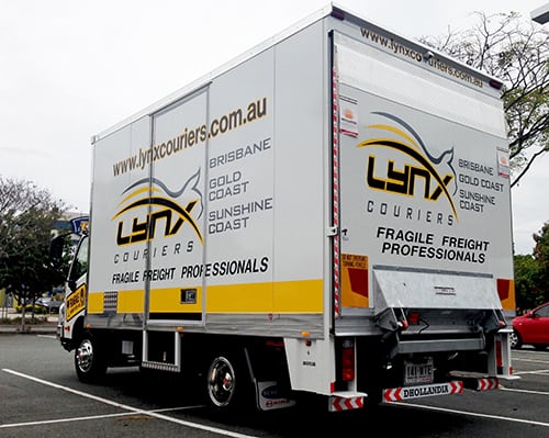 Lynx Couriers side loading taxi truck
